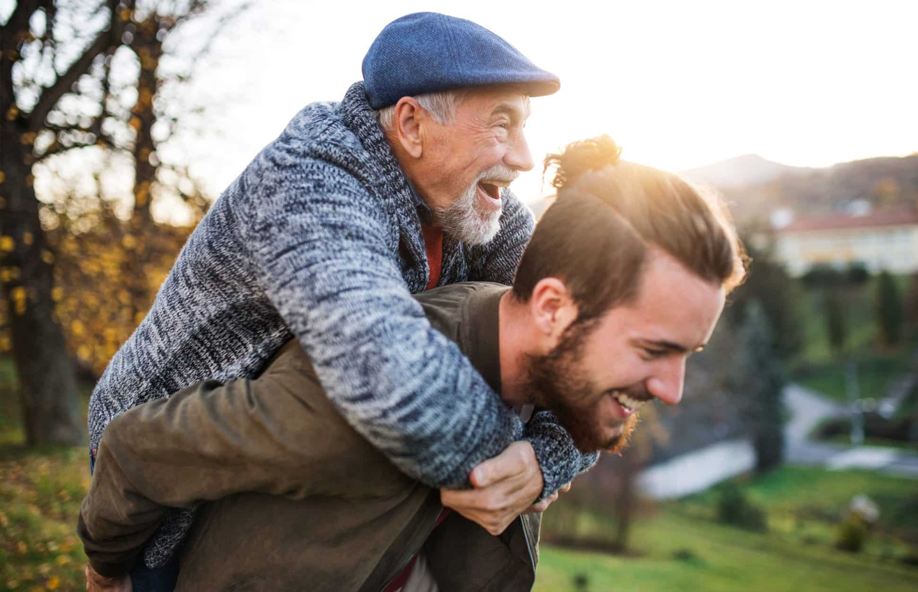 Elderly father and adult son