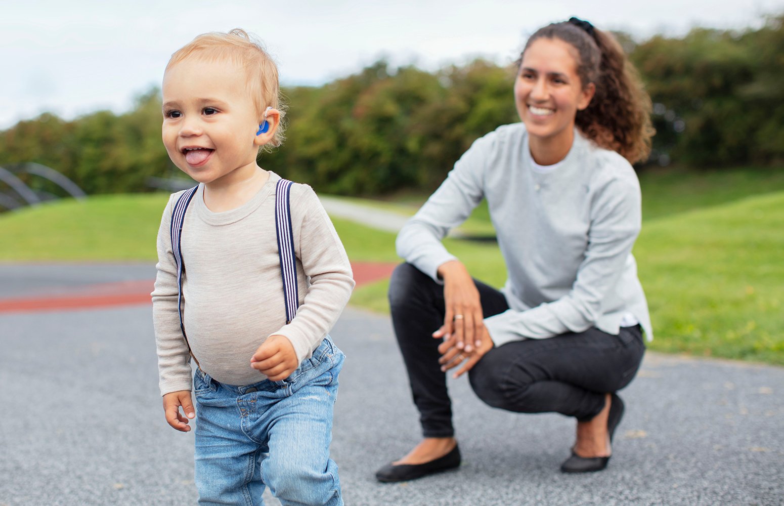 Toddler with hearing aid