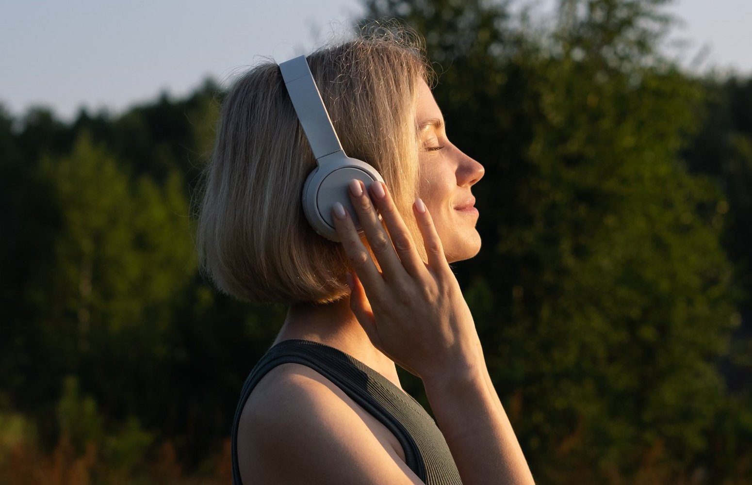 Woman listening to music outside